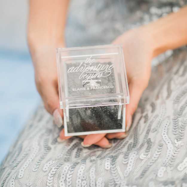 Inspiration - bride holding an clear acrylic ring box